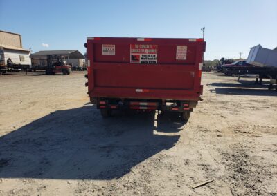 Roll-off container loaded with construction debris
