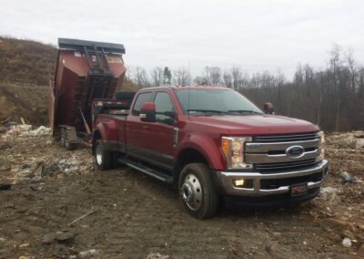 Roll-off container holding renovation and demolition debris